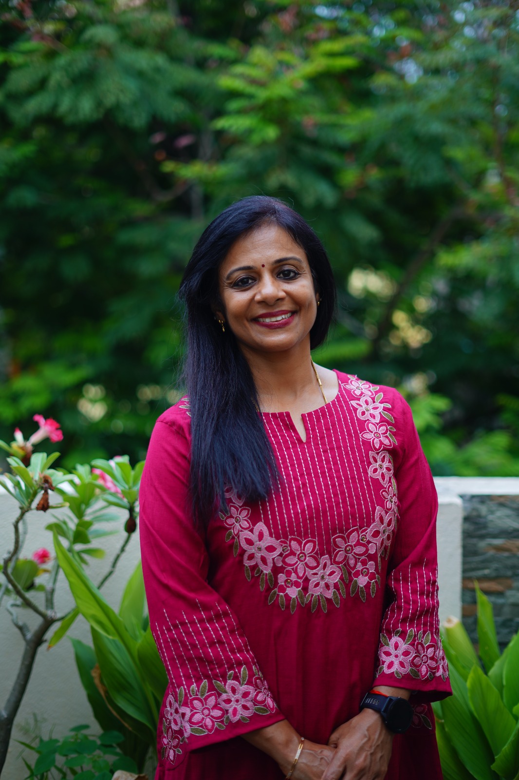 Sushma, founder of Eat Well Live Well and coach behind NourisHer